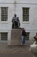 315-0596 Posing with Statue of John Harvard.jpg